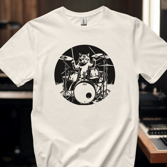 White t-shirt with a graphic of a cute cat playing full set of drums on a blurred music studio background